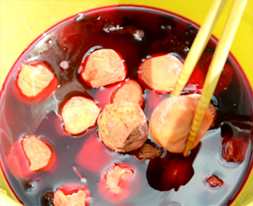 Submerge the Dried Plums in Red Vinegar